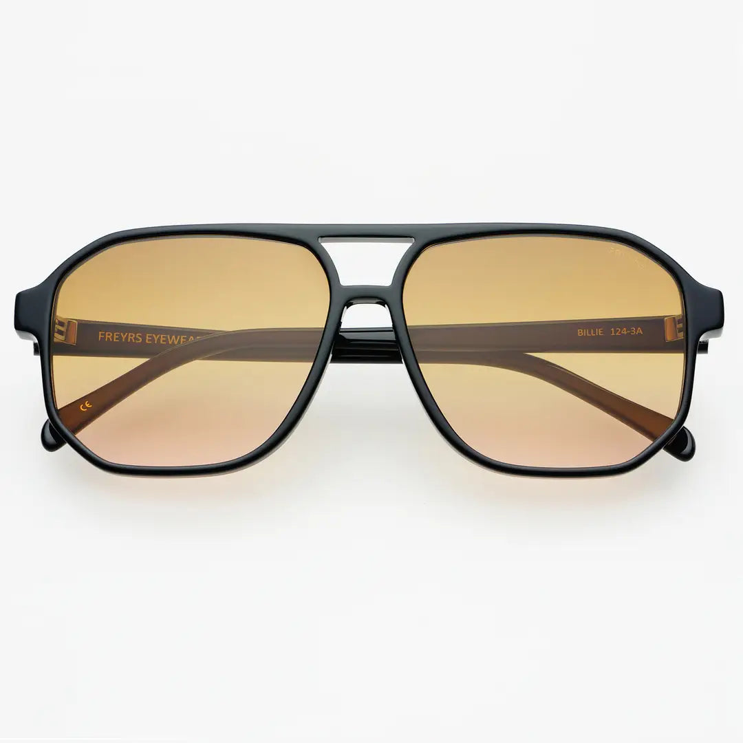 Aviator sunglasses with gold gradient lenses on a white background