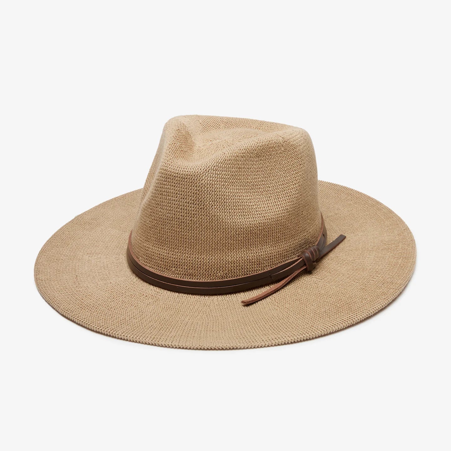 Tan straw hat with a brown leather band on a white background