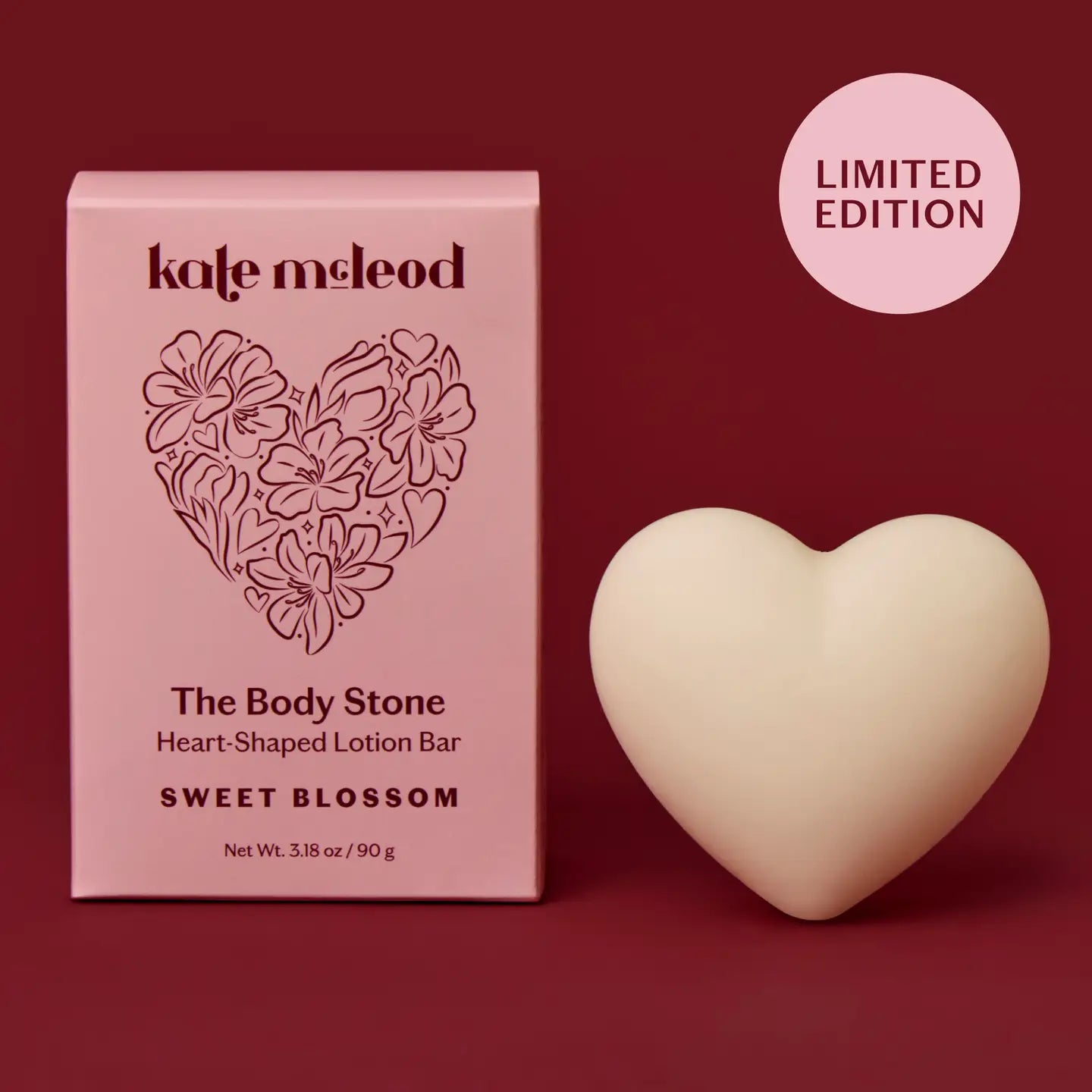Heart-shaped lotion bar with packaging labeled on a red background