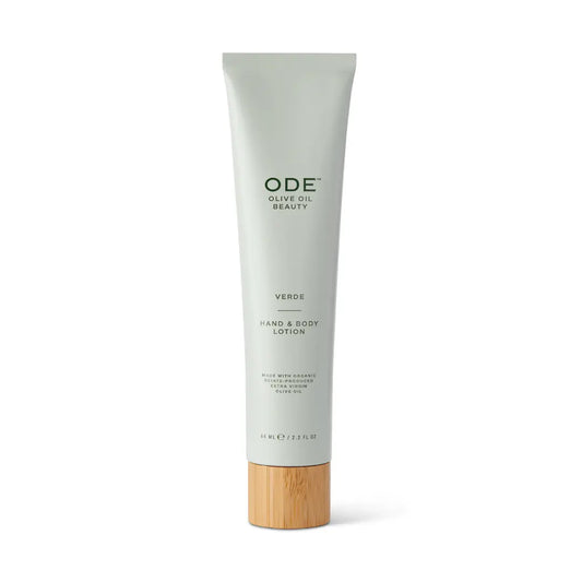 Tube of ODE Olive Oil Beauty Verde Hand & Body Lotion with a wooden cap on a white background