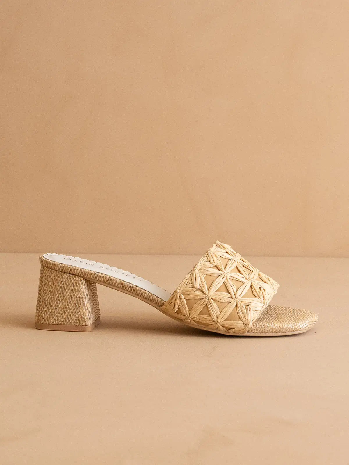 The Winona features an intricately woven raffia upper and a sturdy block heel. Women's sandals.