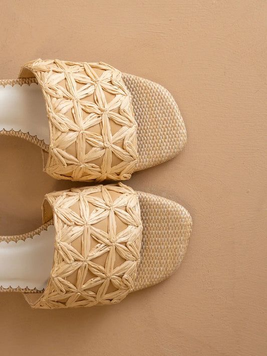 Top view of the Winona features an intricately woven raffia upper and a sturdy block heel. Women's sandals.