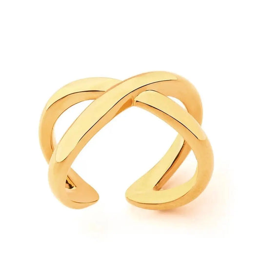 Gold ring with a crisscross design on a white background
