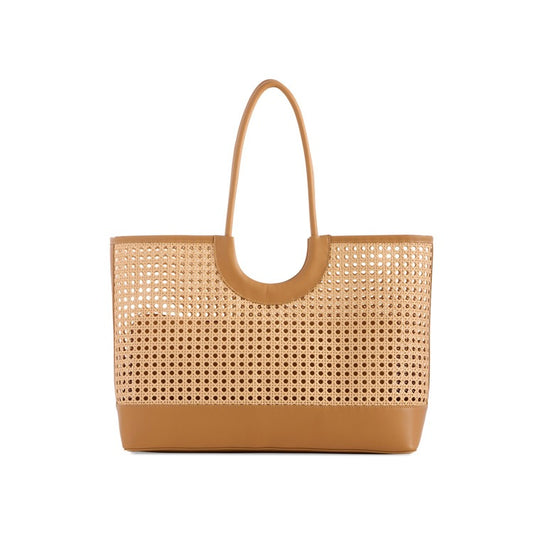 Woven handbag with tan handle and base on a white background