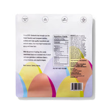 Load image into Gallery viewer, Back of a candy packaging with colorful abstract designs and text.
