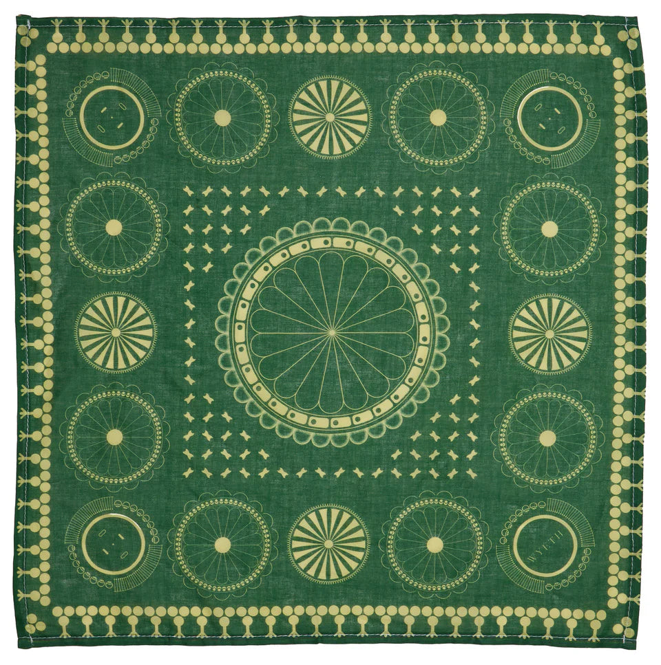 Green bandana with gold circular patterns