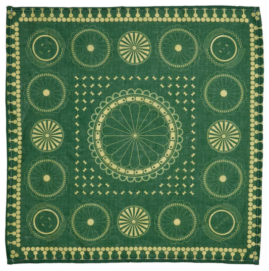 Green bandana with gold circular patterns
