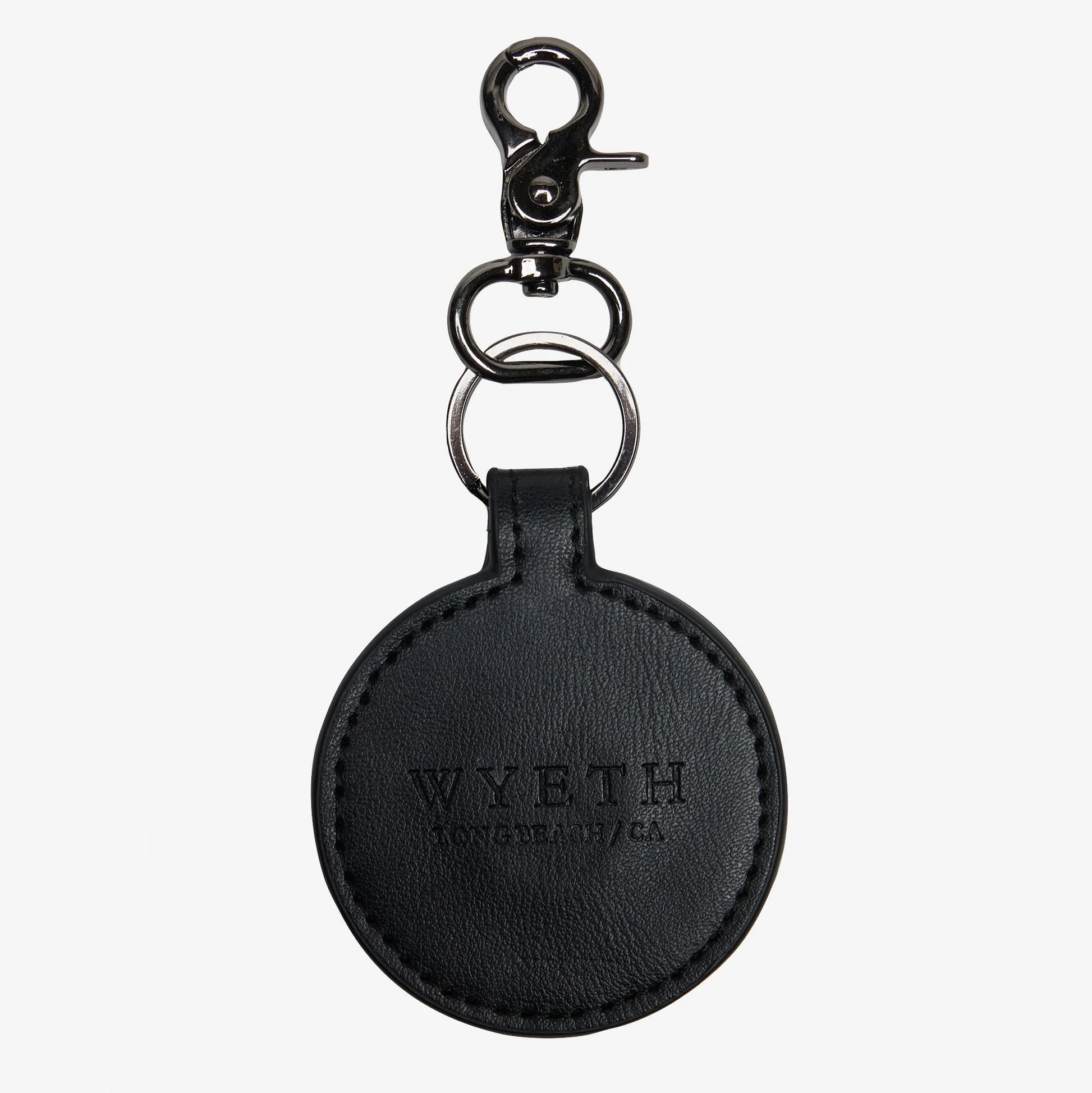 Black leather hat clip with a metal clasp on a white background